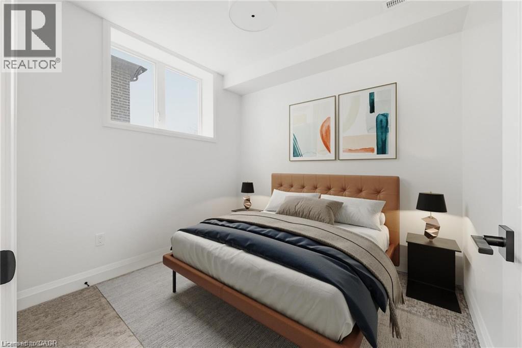 Recessed ceiling light, white painted walls, and a single horizontal window - 36 Elliott Street Unit# 1, Cambridge, ON