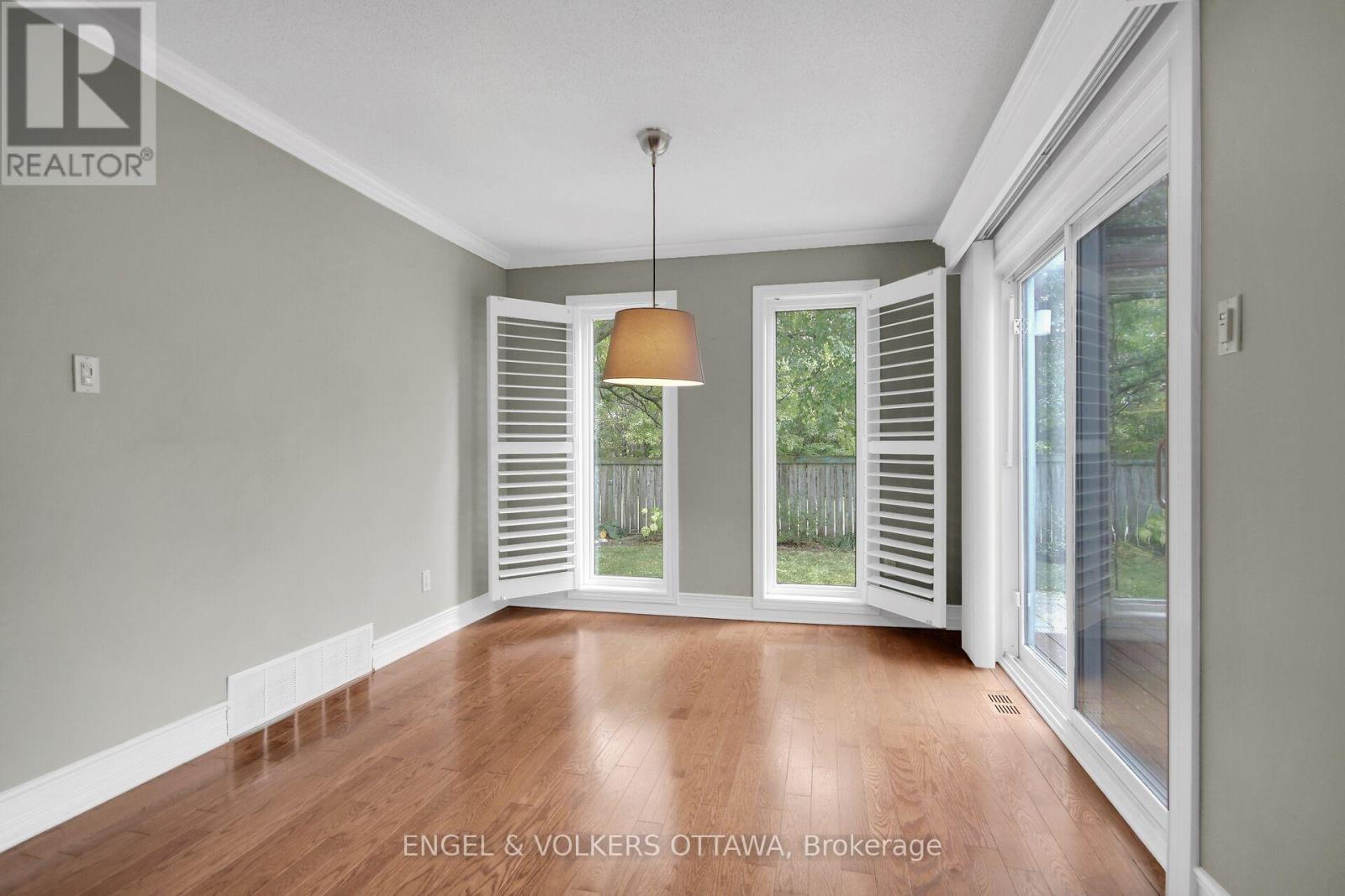 Bright dining room overlooking the private yard. - 24 Tammela Court, Ottawa, ON