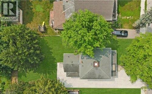 featuring mature trees and 6-7 car  paved driveway - 245 Lowther Street S, Cambridge, ON 