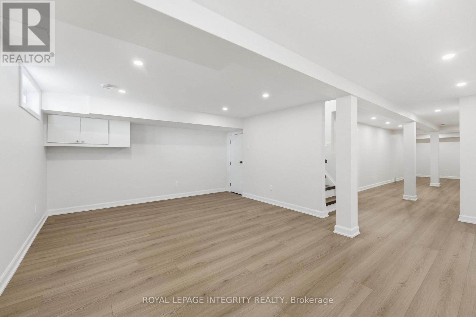 Lower level family room with gas fireplace - 2007 Dorval Avenue, Ottawa, ON
