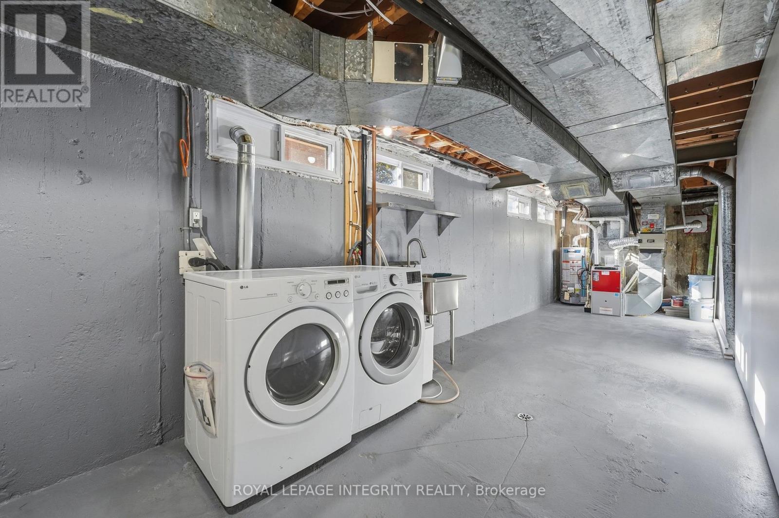 Laundry room and utility area with tons of storage - 2007 Dorval Avenue, Ottawa, ON