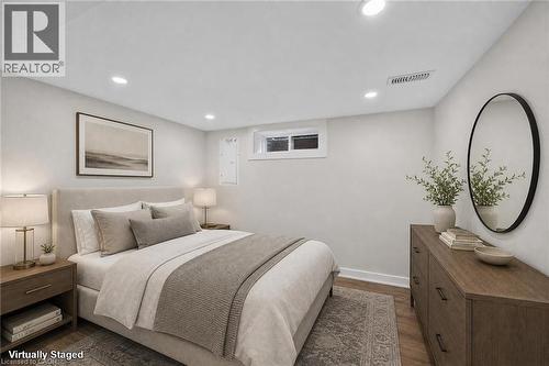 Recessed lighting, wood-finish flooring, white walls, and a low-profile window - 331 East 17Th Street, Hamilton, ON 