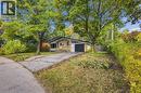 Single-story residence featuring a brick facade and a sloped roofline - 246 Hillcrest Road, Cambridge, ON 