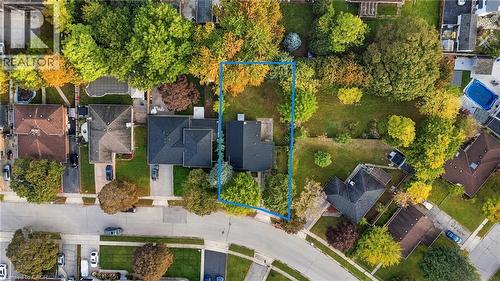 Aerial view showcasing a residential property with a dark shingle roof and a spacious lawn - 246 Hillcrest Road, Cambridge, ON 