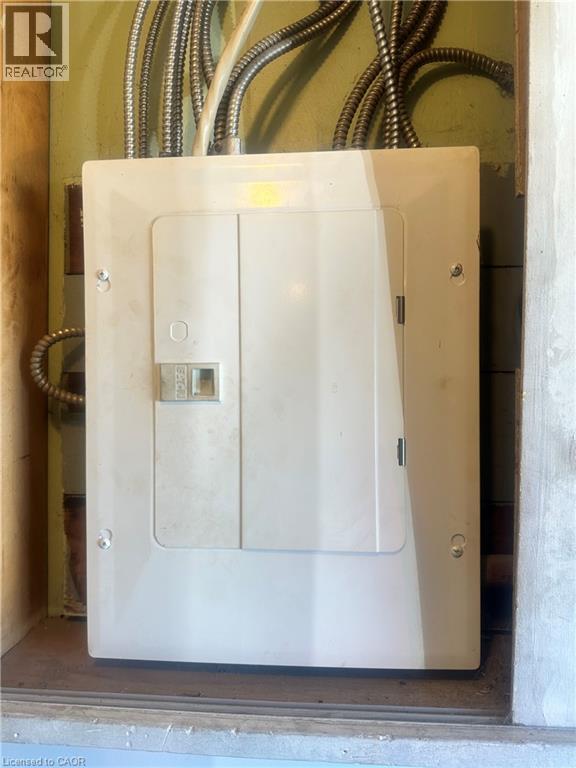 Electrical service panel with metal-clad conduit cabling - 150 Princess Street, Hamilton, ON