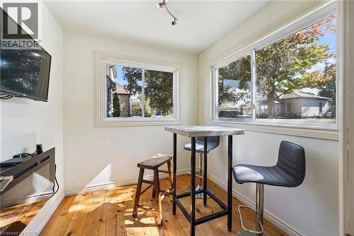 Wood-finish flooring with white baseboards - 74 Selkirk Street, Cambridge, ON 
