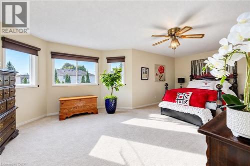 Primary bedroom features a 4 piece ensuite bathroom and a walk-in closet. - 11 Peregrine Crescent, Cambridge, ON 