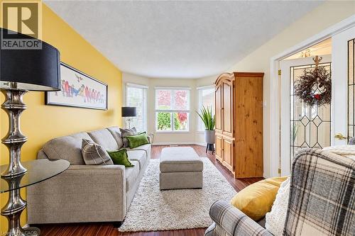 Formal living room with large window. - 11 Peregrine Crescent, Cambridge, ON 