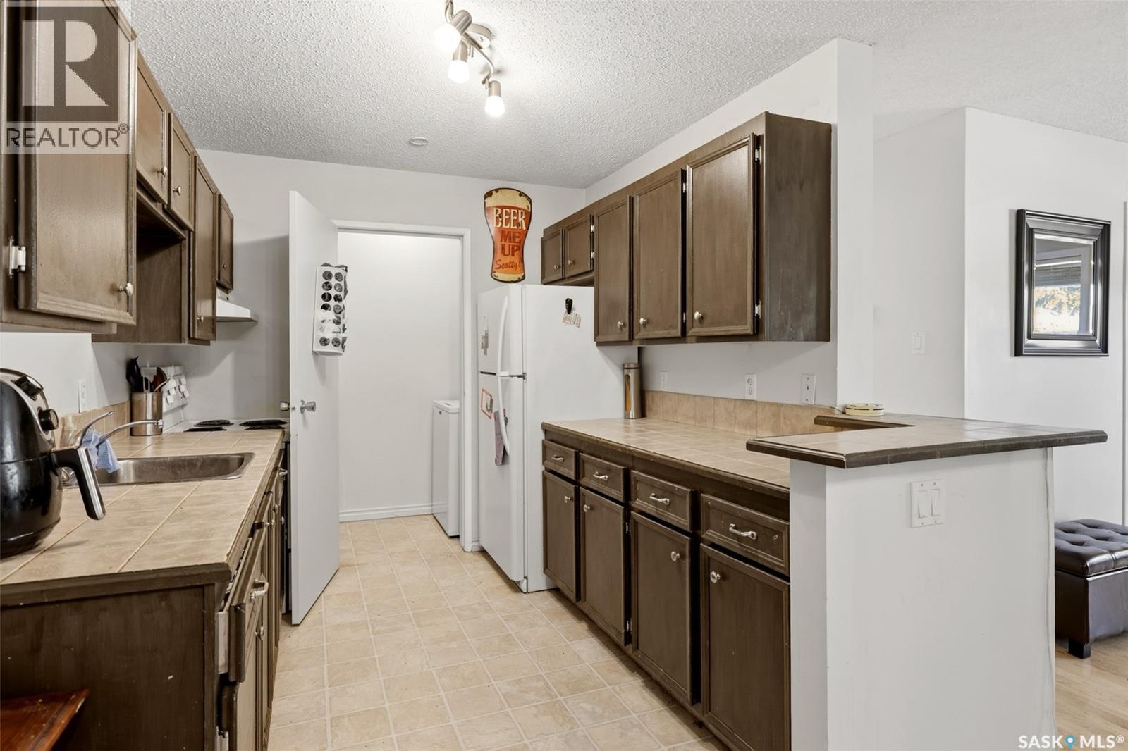 202 2511 Neff Road E, Regina, SK