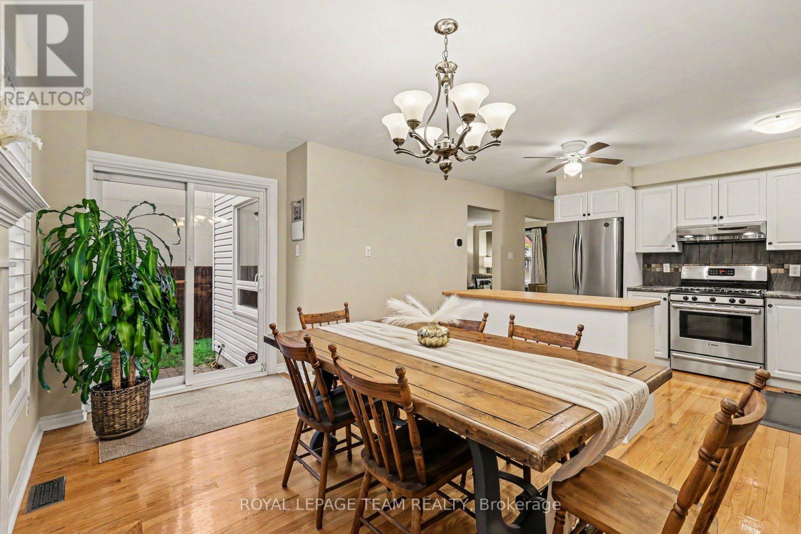 Second dining area open to kitchen w/fireplace - 4 Degas Court, Ottawa, ON