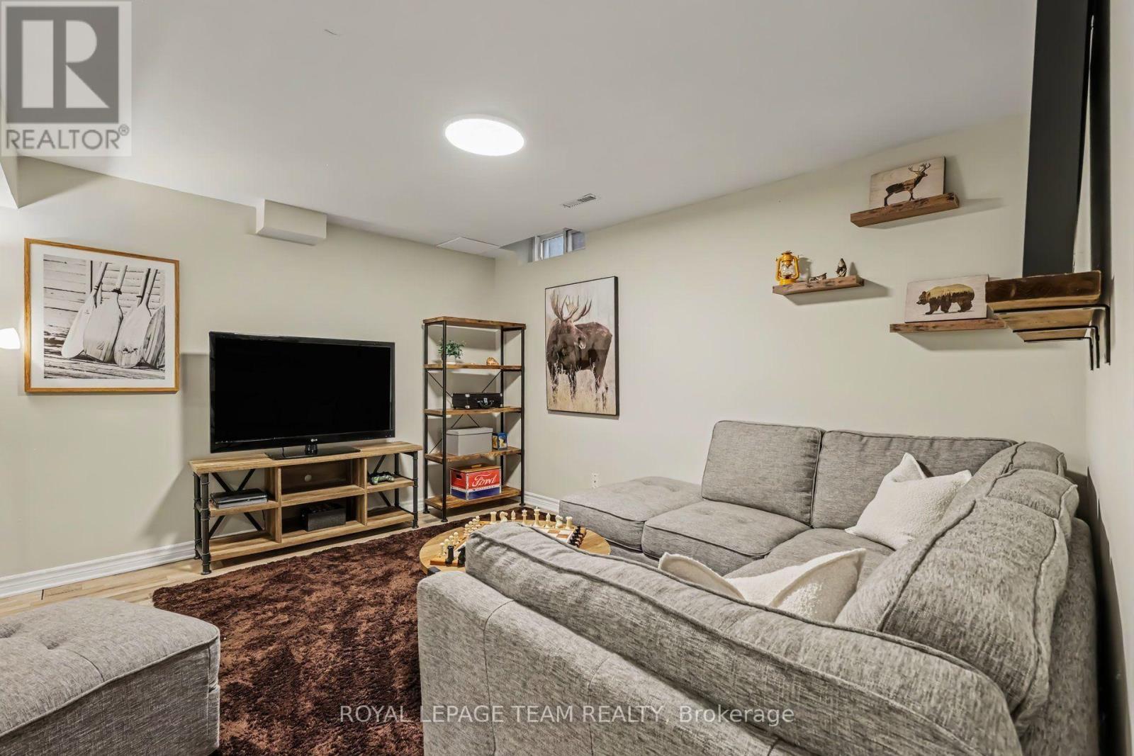 Family room in finished basement - 4 Degas Court, Ottawa, ON