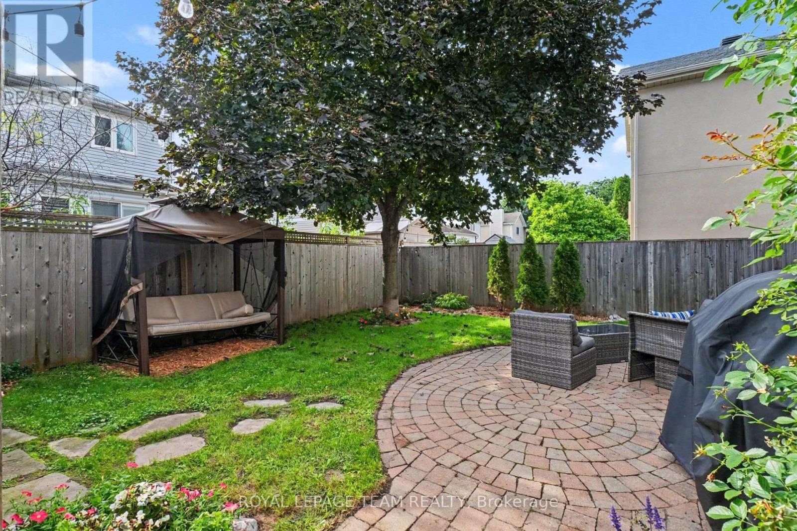 Landscaped and fully fenced backyard with shed - 4 Degas Court, Ottawa, ON