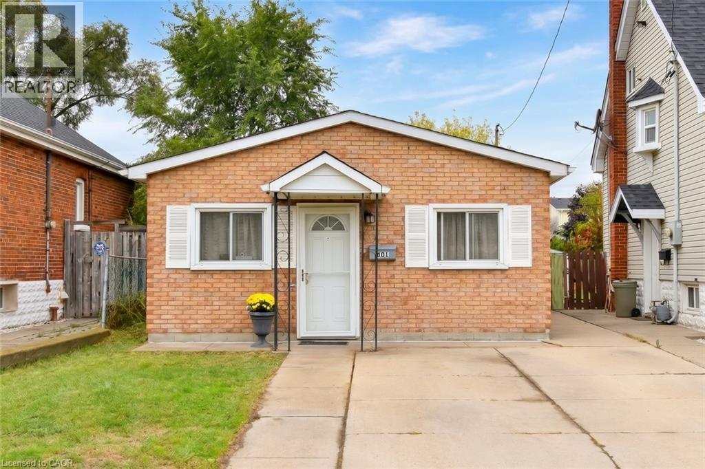 Double Driveway and Lots of Street parking for visitors. - 201 Strathearne Avenue, Hamilton, ON