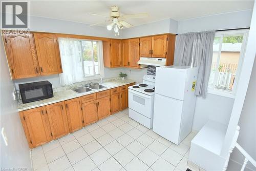 Steps up to your spacious kitchen - 201 Strathearne Avenue, Hamilton, ON 