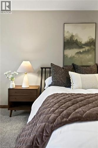 Neutral interior wall paint and carpeted flooring - 53 Bastille Street, Hamilton, ON 