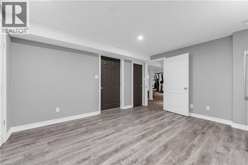 Basement Room with double closets and direct access to the garage. - 847 West 5Th Street, Hamilton, ON 