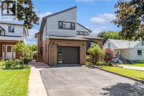Single Car Garage with stairs to basement and entrance to main level of the house. - 847 West 5Th Street, Hamilton, ON 