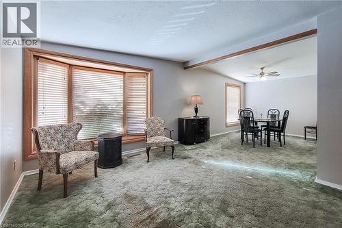 Bright living and dining areas with large windows and a comfortable open connection between spaces - 286 Mohawk Road W, Hamilton, ON 