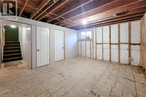 Generous unfinished basement space with existing storage closets and room for future improvements - 286 Mohawk Road W, Hamilton, ON 
