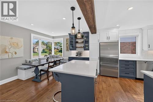 Banquette seating and kitchen island offer ample seating for a growing family. And a fabulous Coffee Bar! - 10 Mulock Avenue, Hamilton, ON 