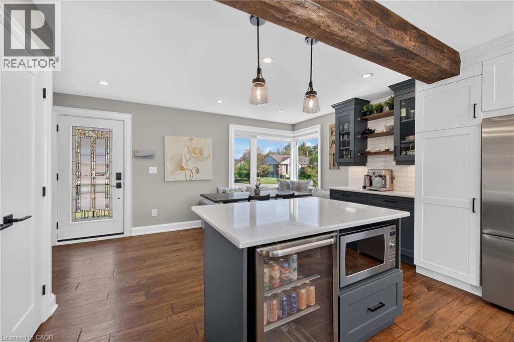 Large corner windows add to the charm of this kitchen. - 10 Mulock Avenue, Hamilton, ON