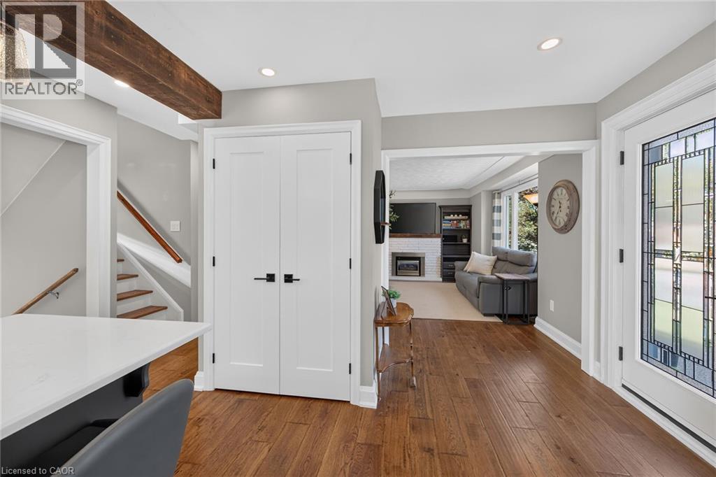 Overview of the living room from the kitchen. - 10 Mulock Avenue, Hamilton, ON