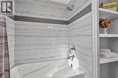 Grey accents and beautiful tile decor. Built in shelving. - 10 Mulock Avenue, Hamilton, ON 