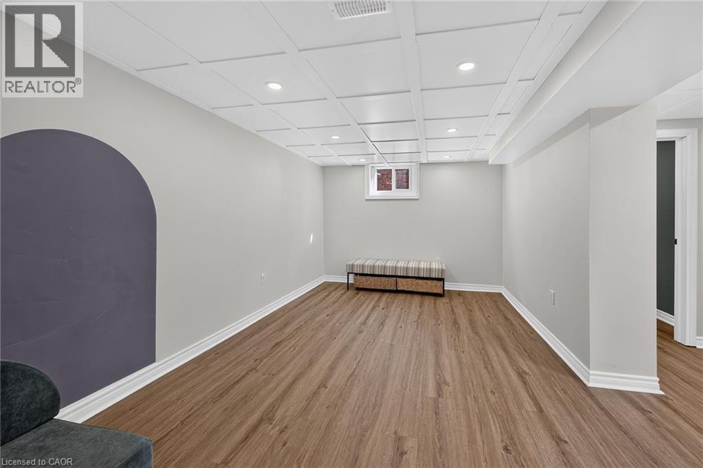 This end of the recreation room could easily be converted to an additional bedroom without sacrificing much living space. Or, makes an ideal spot for a family room with tv. - 10 Mulock Avenue, Hamilton, ON