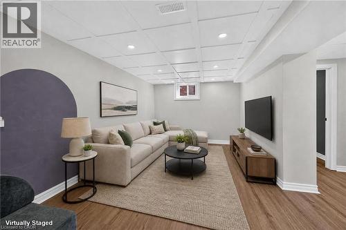 Virtually staged option for the Recreation Room. - 10 Mulock Avenue, Hamilton, ON 