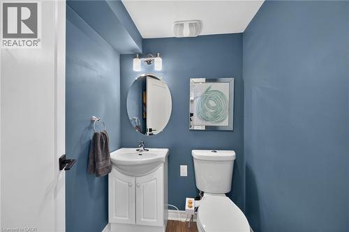 Convenient 2pc bathroom in the lower level. - 10 Mulock Avenue, Hamilton, ON 