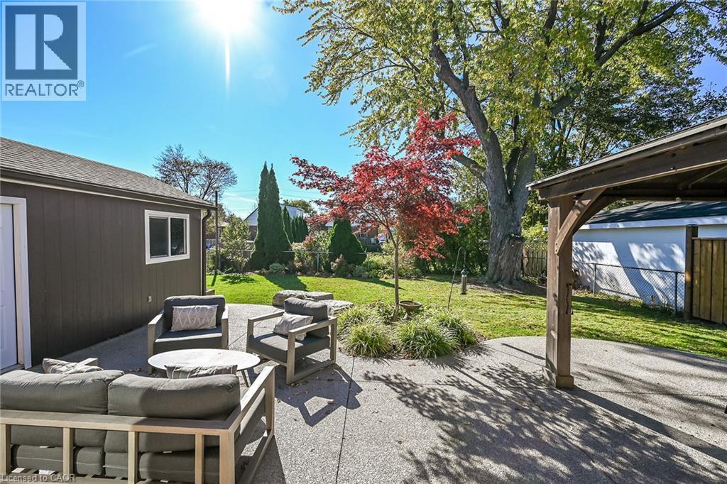 Fenced, level and shaded ... beautiful outdoor space! - 10 Mulock Avenue, Hamilton, ON