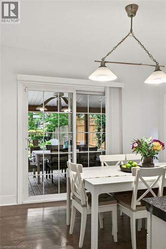 Sliding glass doors opening to an outdoor deck - 66 Beechwood Avenue, Hamilton, ON 