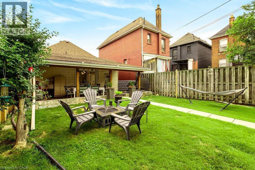 Outdoor seating around firepit - 66 Beechwood Avenue, Hamilton, ON