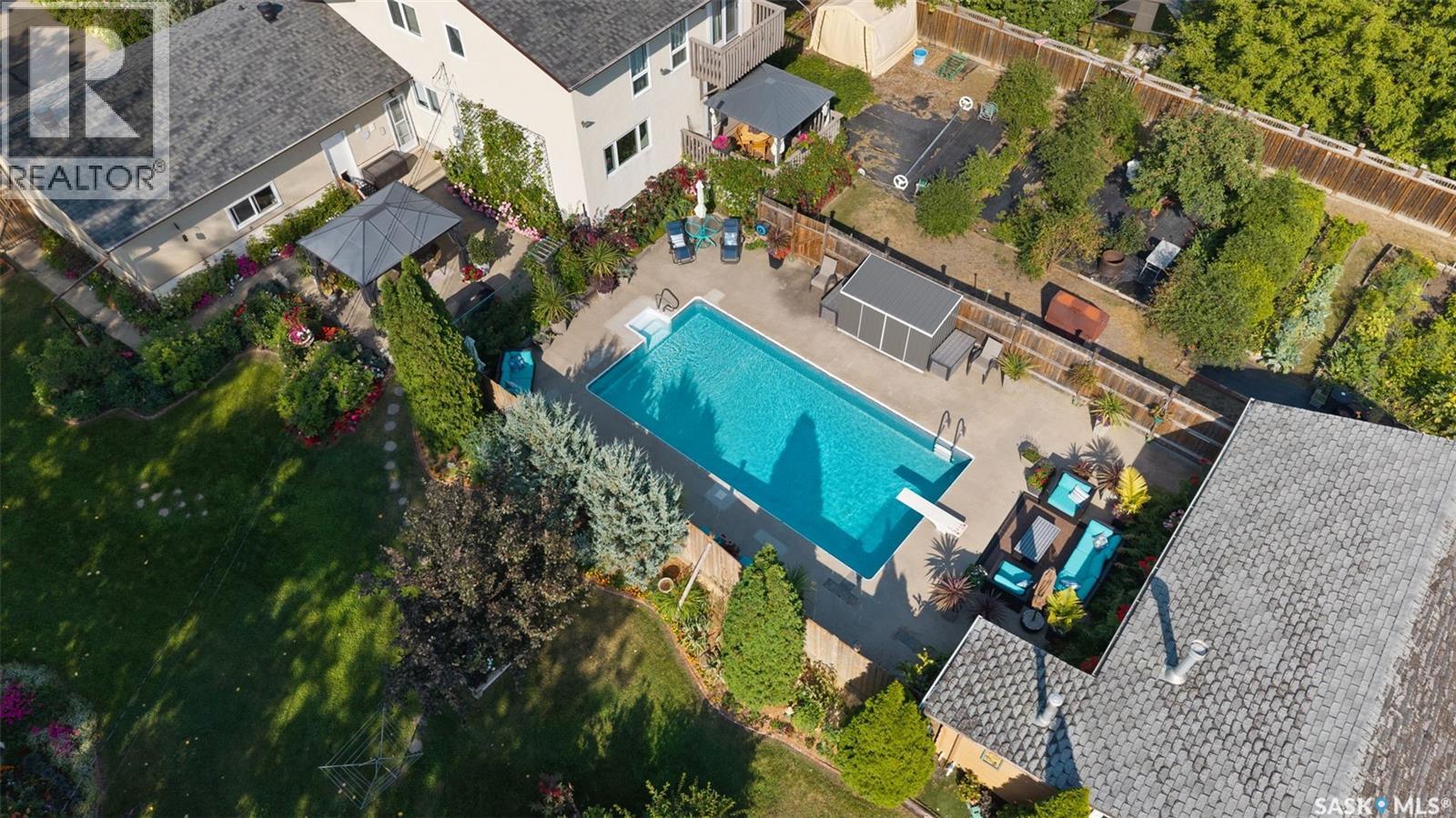 23 Ridgedale Bay, White City, SK - Outdoor With In Ground Pool With View