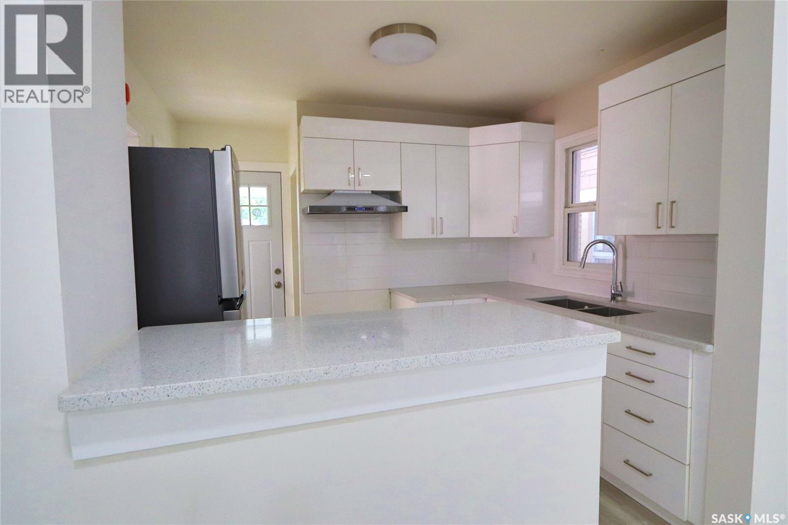 2039 Wallace Street, Regina, SK - Indoor Photo Showing Kitchen With Double Sink