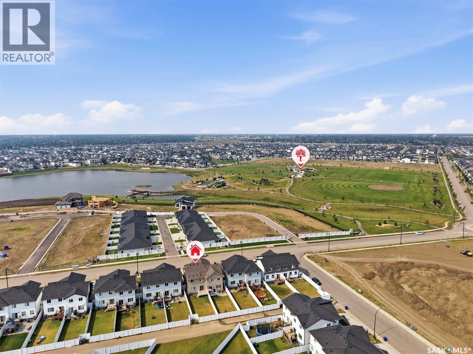 713 Brighton Boulevard, Saskatoon, SK - Outdoor With Body Of Water With View