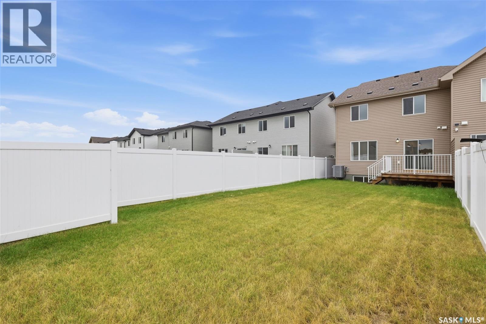 713 Brighton Boulevard, Saskatoon, SK - Outdoor With Backyard With Exterior