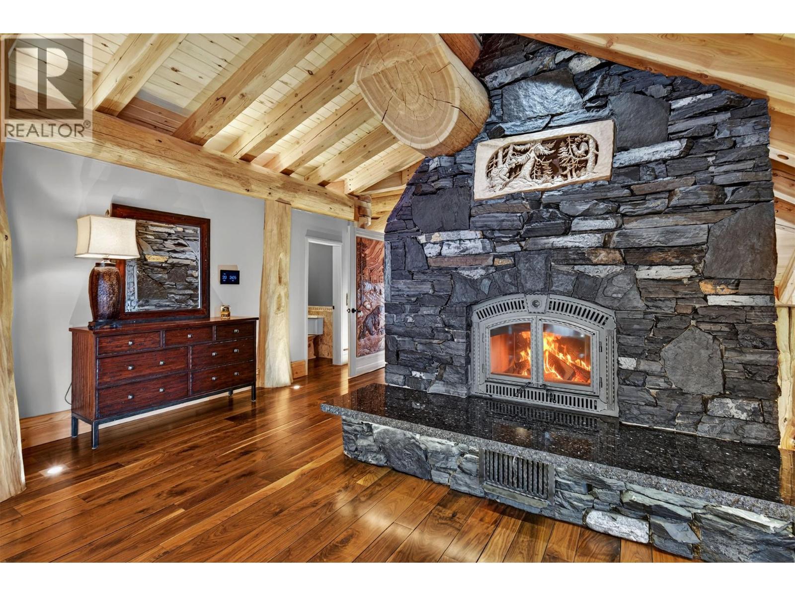 525 Feathertop Way, Big White, BC - Indoor Photo Showing Living Room With Fireplace