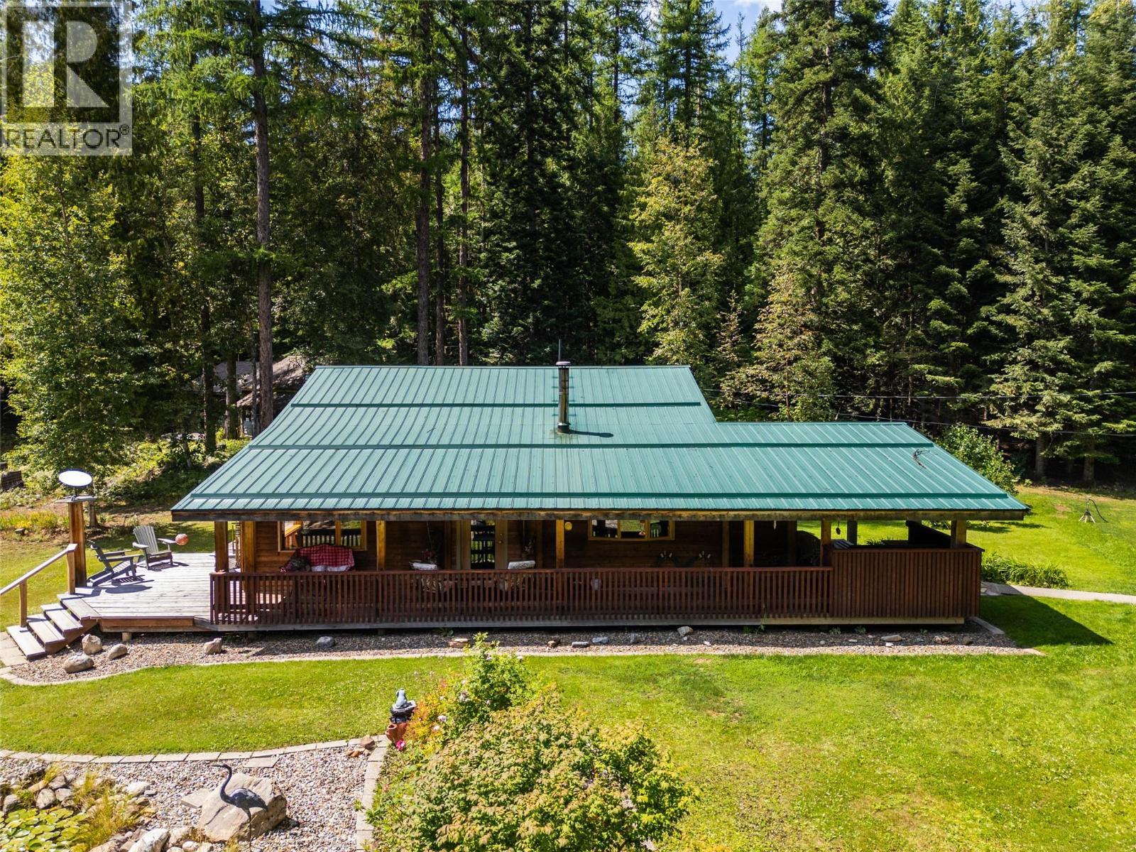 541 Bear Road, Salmo, BC - Outdoor With Deck Patio Veranda With Backyard