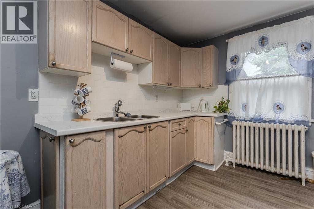 1088 King Street E, Hamilton, ON - Indoor Photo Showing Kitchen With Double Sink