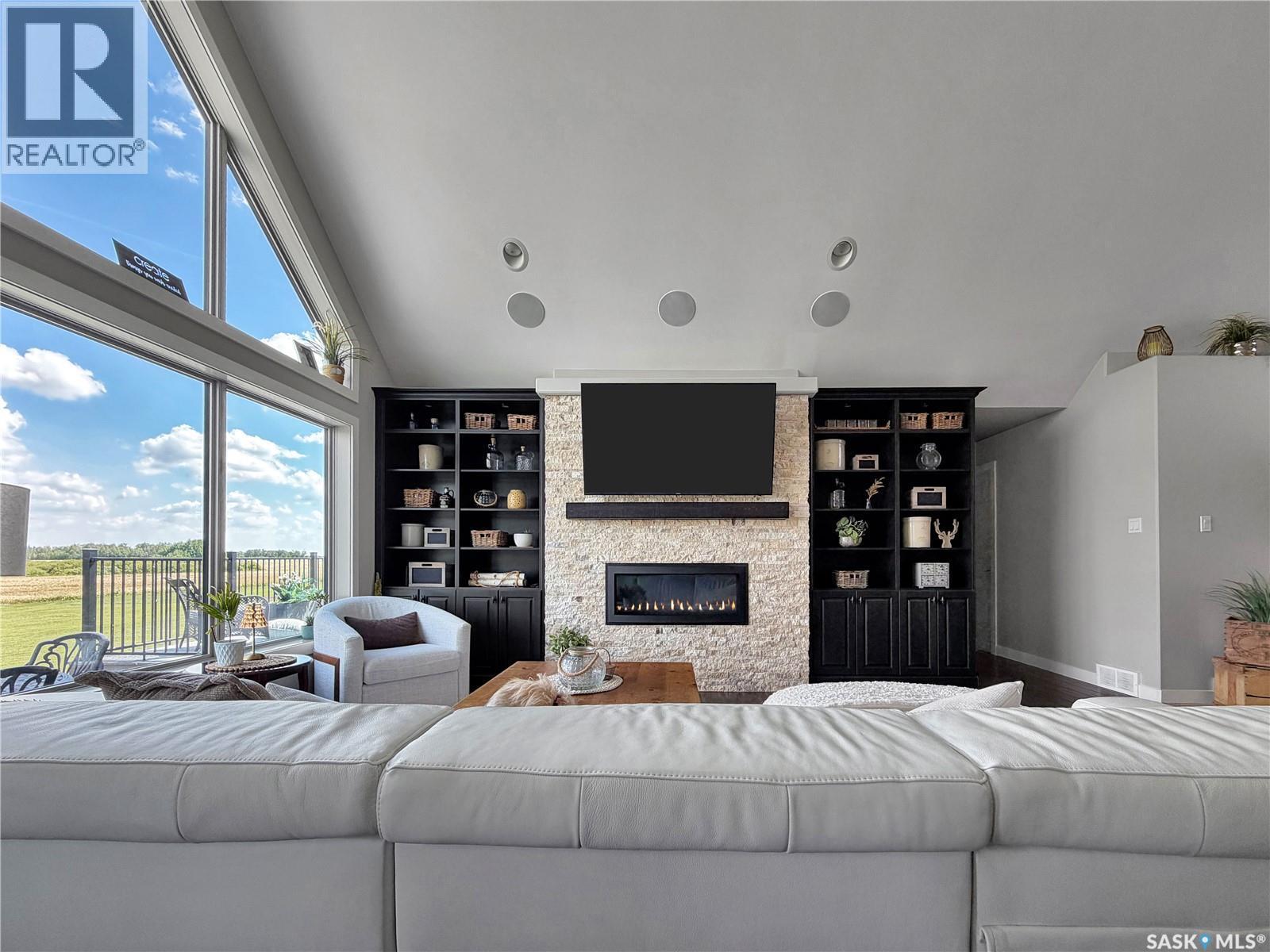 Bell Acreage, Brock Rm No. 64, SK - Indoor Photo Showing Living Room With Fireplace