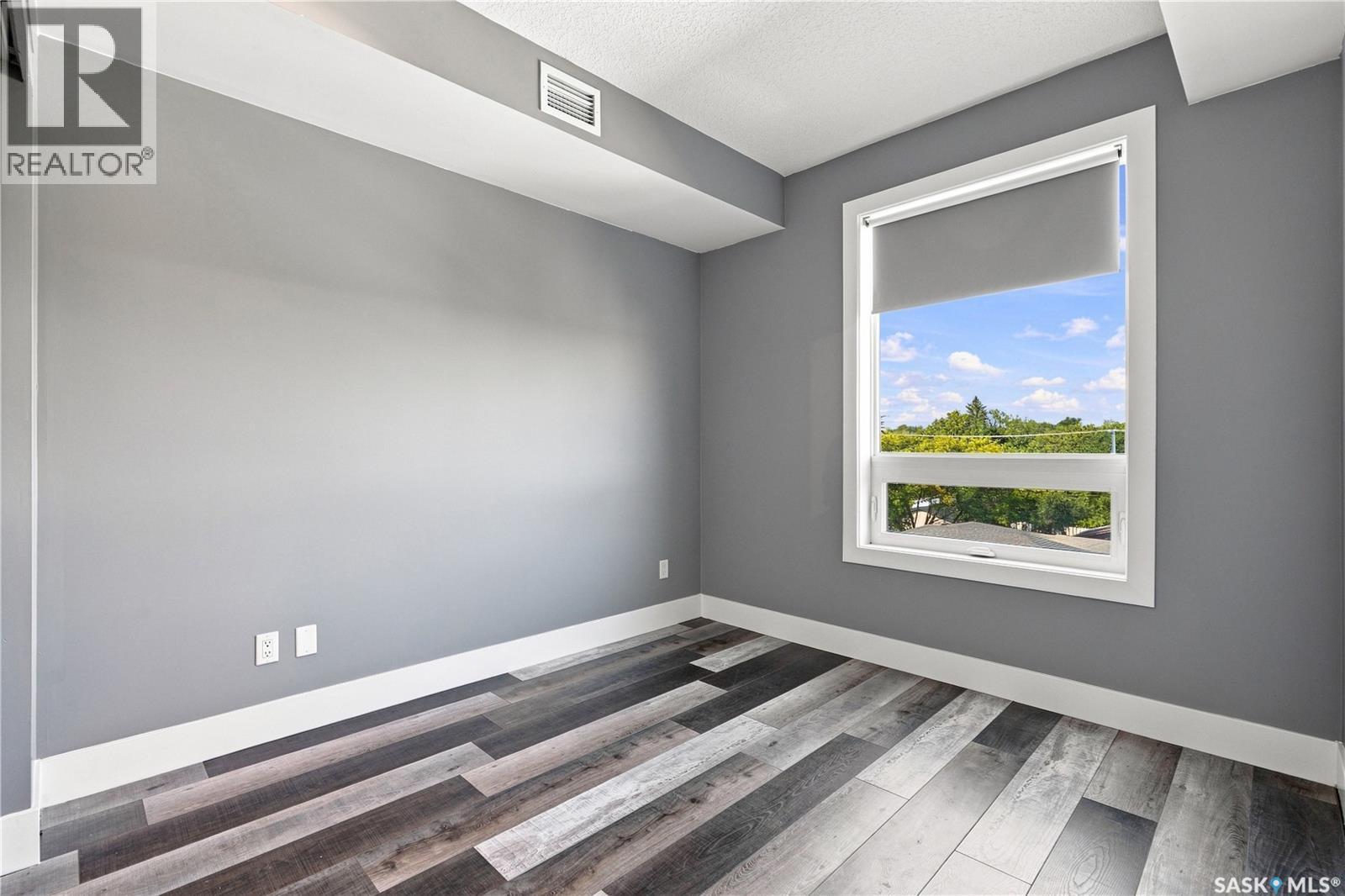 310 404 C Avenue S, Saskatoon, SK - Indoor Photo Showing Other Room