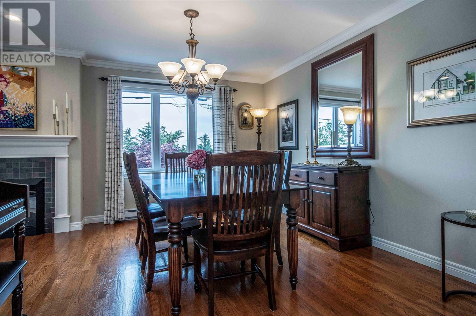 32 Dawsons Run, Conception Bay South, NL - Indoor Photo Showing Dining Room With Fireplace
