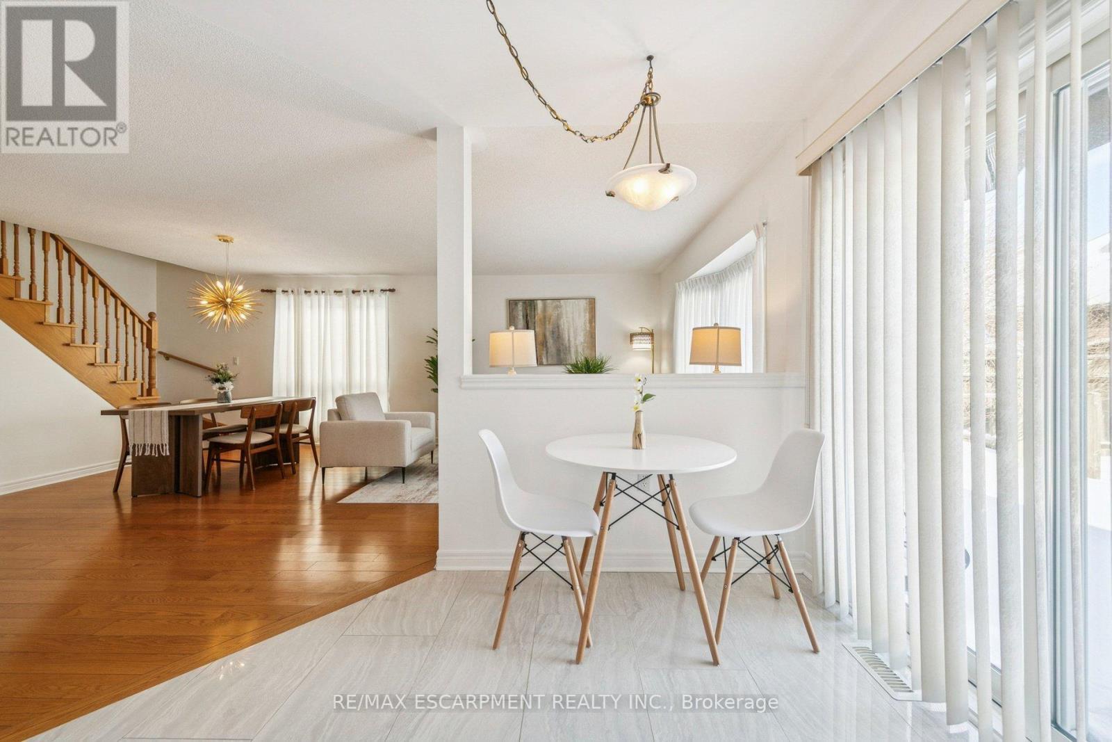 Breakfast area with walkout to patio - 245 Centennial Forest Drive, Milton, ON - Indoor Photo Showing Dining Room
