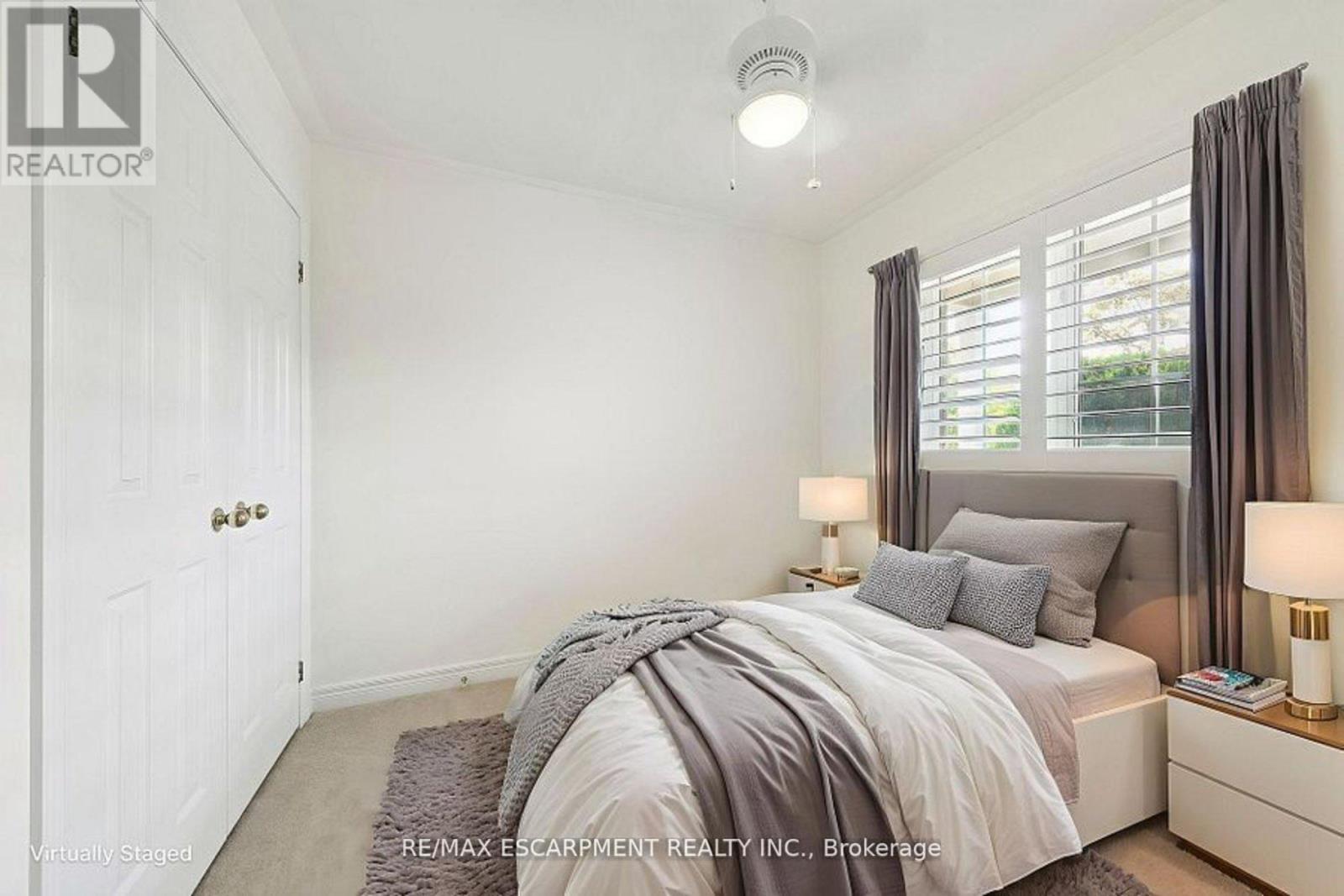 Second Bedroom virtually staged as a bedroom - 245 Centennial Forest Drive, Milton, ON - Indoor Photo Showing Bedroom