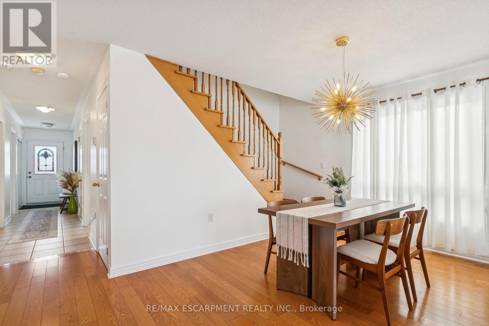 Heading upstairs - 245 Centennial Forest Drive, Milton, ON - Indoor Photo Showing Dining Room