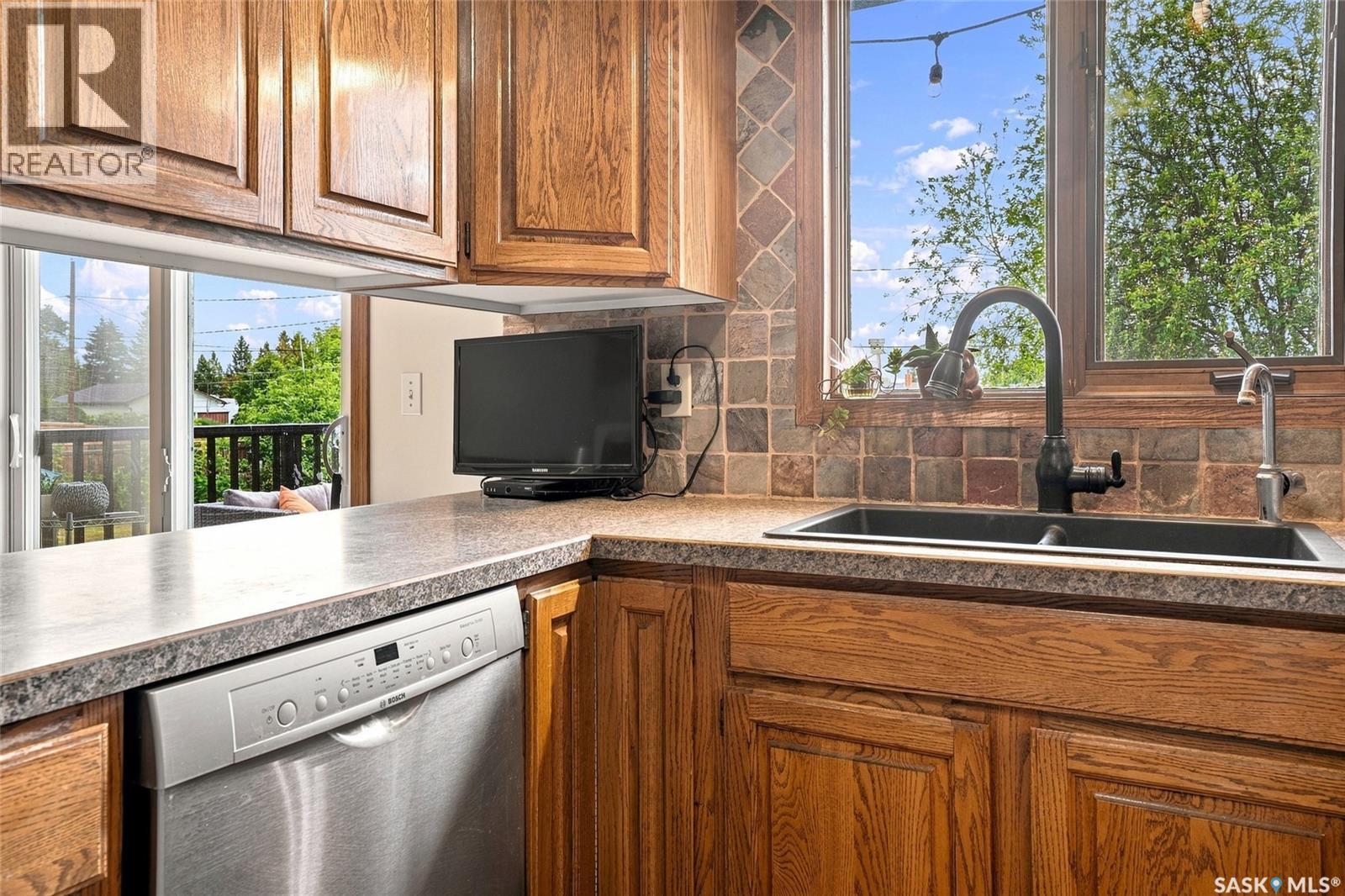 109 South Avenue E, Hafford, SK - Indoor Photo Showing Kitchen With Double Sink
