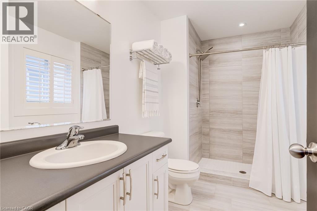 Full bathroom featuring vanity and a shower stall - 239 Cranbrook Street, Kitchener, ON - Indoor Photo Showing Bathroom