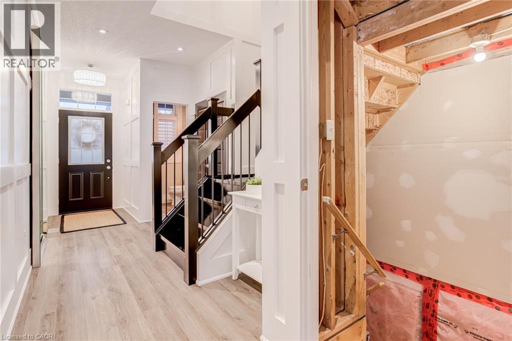 Entryway with stairway and light wood-type flooring - 239 Cranbrook Street, Kitchener, ON - Indoor Photo Showing Other Room