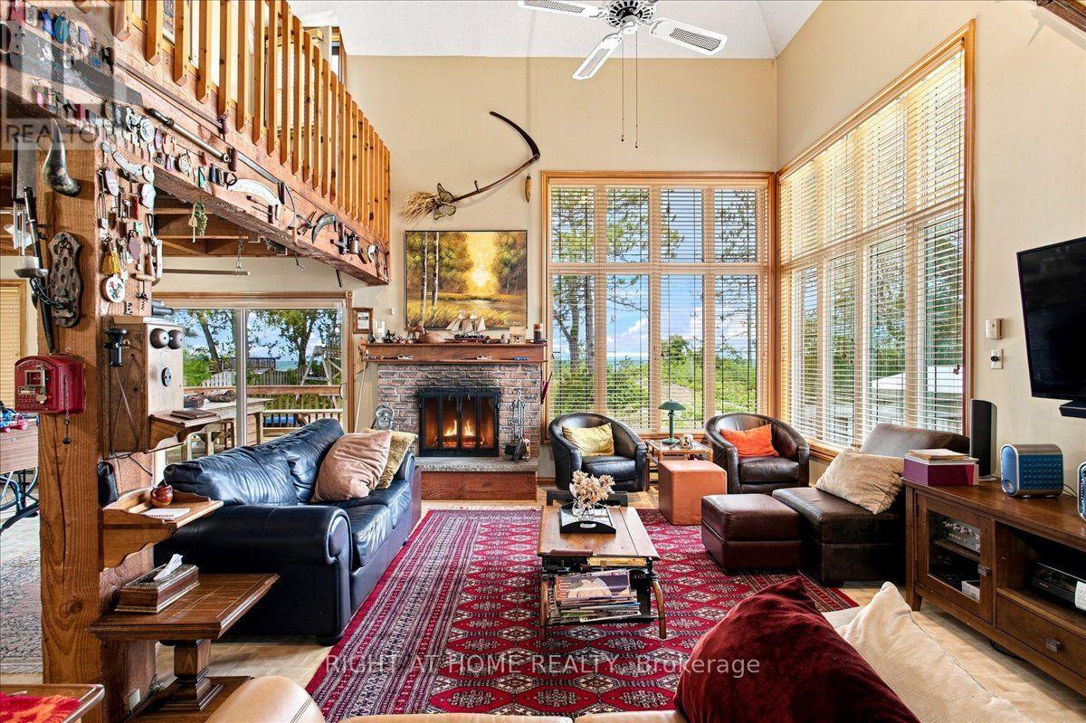 12 James Street, Tiny, ON - Indoor With Fireplace